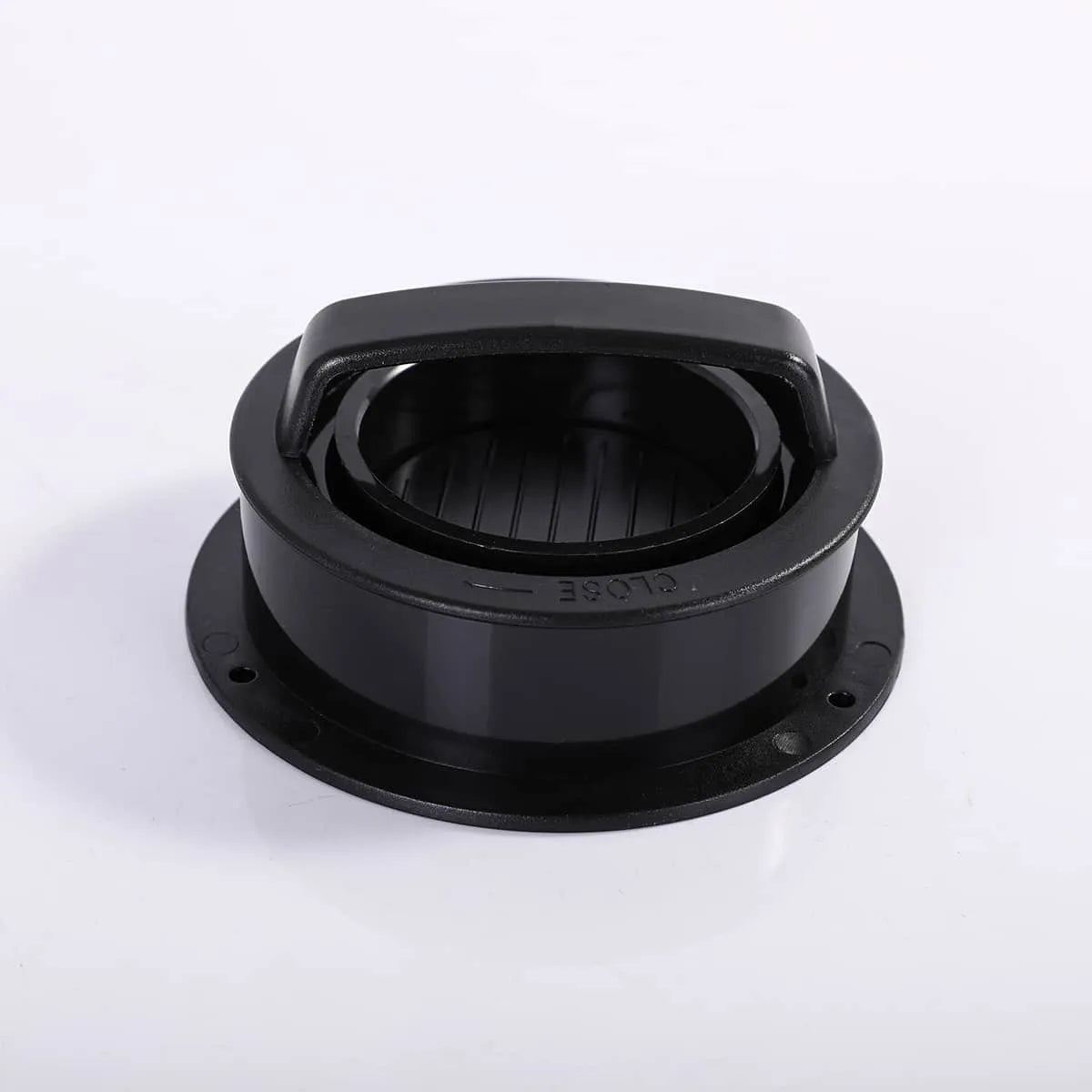 Black plastic component on a white background