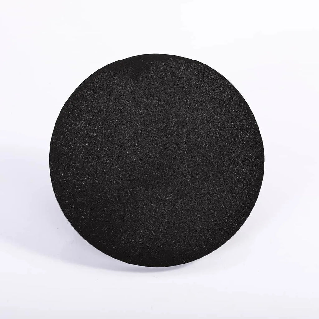 Black round object on a white background