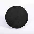 Black round object on a white background