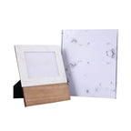 Marble-patterned photo frame and paper on a white background