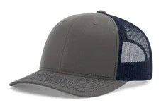 Charcoal front and navy blue mesh back trucker hat with curved brim on white background
