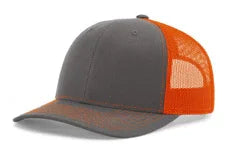 Charcoal gray and neon orange mesh trucker hat with curved brim and adjustable back