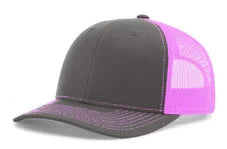 Charcoal gray trucker cap with neon pink mesh back and neon pink stitching on the bill