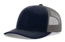 Navy blue and charcoal gray trucker hat with mesh back and curved bill isolated on white