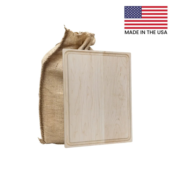 Wooden cutting board with burlap bag and American flag indicating 'Made in the USA'.